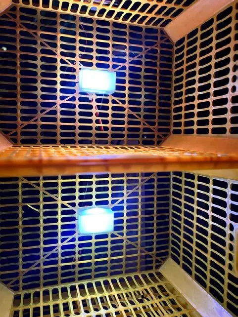 Light modules at rest inside the crates, glowing white