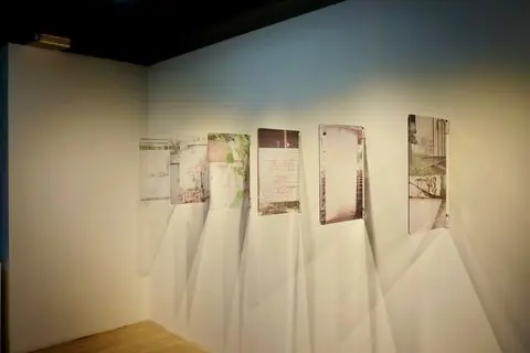 Six photographs on acrylic glass mounted off the wall at angles